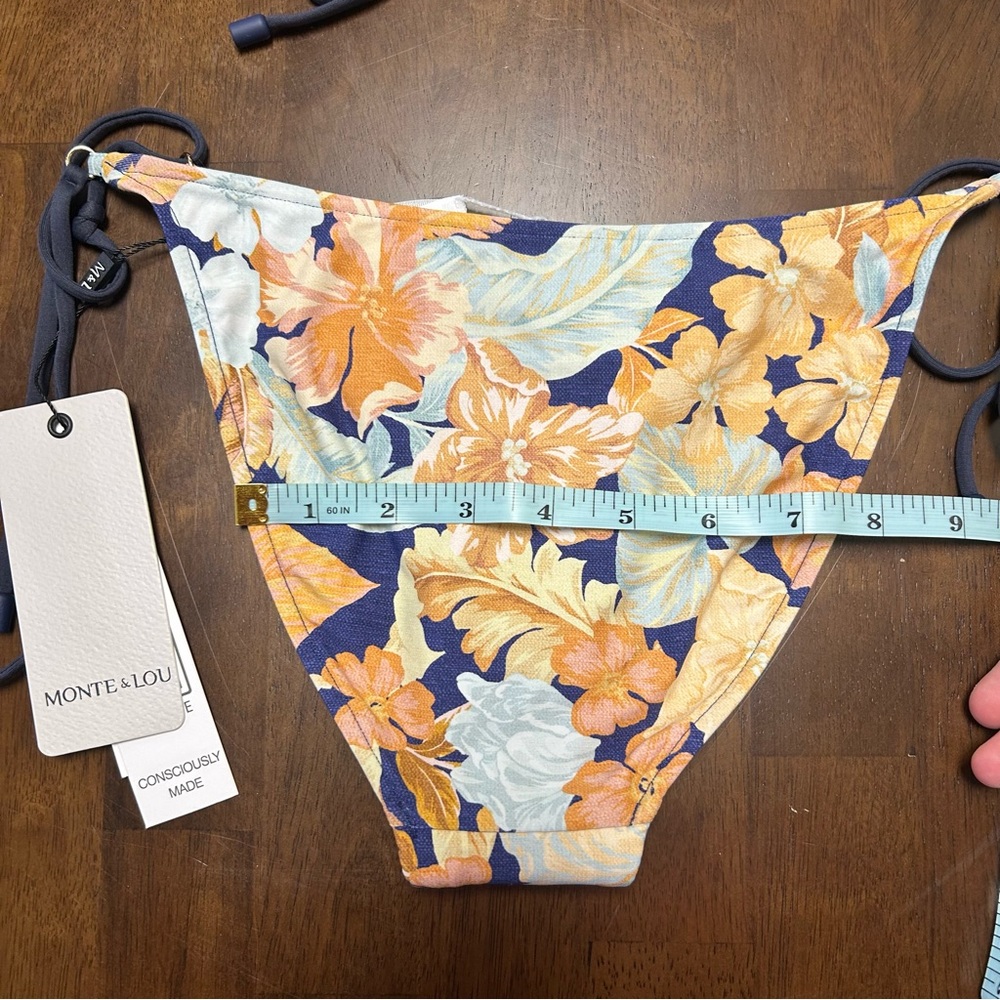 NWT Monte and Lou Paraiso Navy Blue and Orange
Floral String Bikini Set Size 6 - Picture 14 of 16